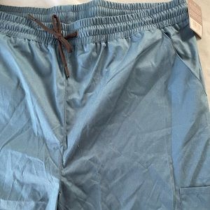 Mens jannuu cargo scrub pants in Caribbean blue, size XXL w/ shorter length. NWT